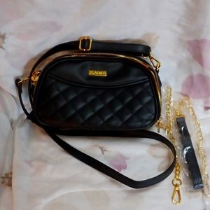 Joy & iman handbag 2 zippered compartments, never used, additional metal strap